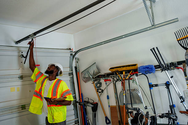 Professional Garage Door Panel Replacement technician working in Halstead, KS