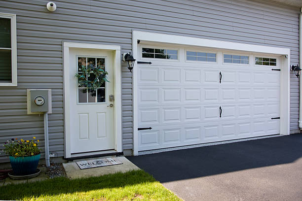 24/7 Emergency Garage Door Panel Replacement experts in Halstead, KS